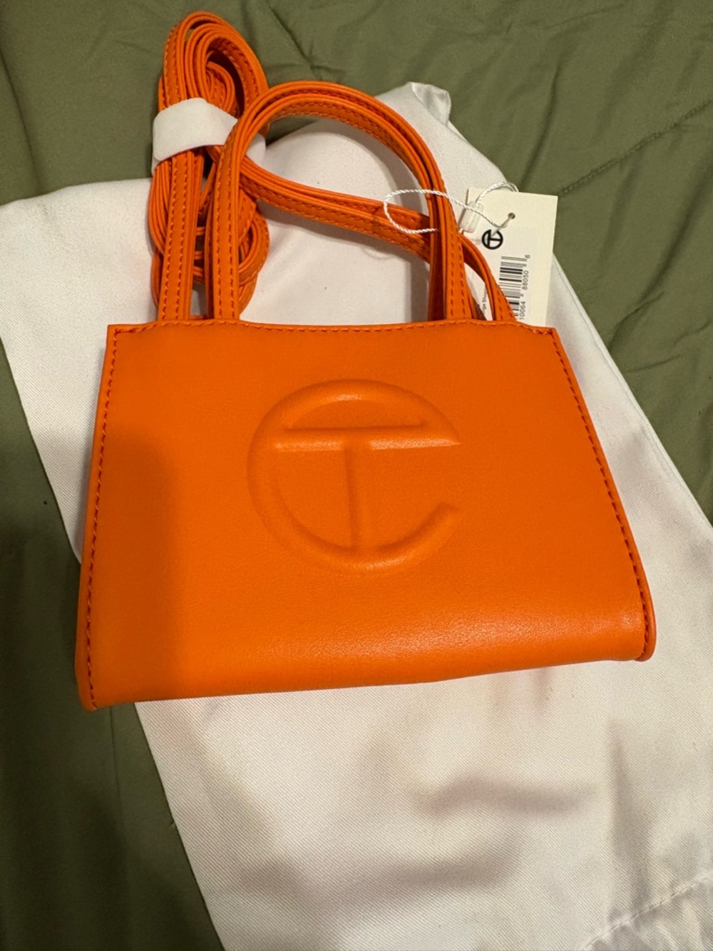 Telfar Orange Crossbody Bag with Embossed Logo